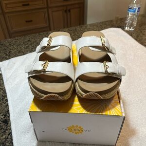 Cute yellow box sandal wedge. White and tan.  Worn once.   Size 9 1/2